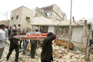 Rescuers Search for Bodies in Al-Mansour Residences